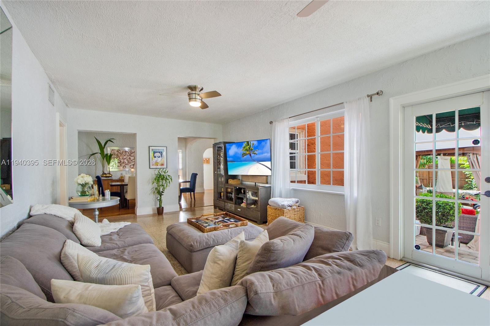 2985 Southwest 13th Street Miami, FL 33145 - Photo 27 of 27 a living room with furniture and a fireplace