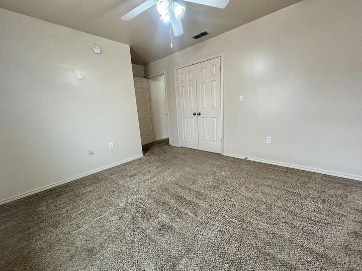 1108 82nd Street, Unit A Lubbock, TX 79423 - Photo 5 of 11 a view of an empty room