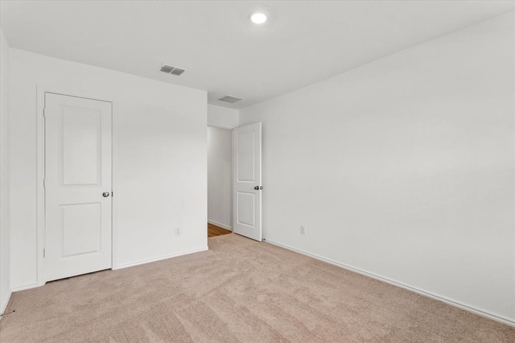 487 Alamito Avenue Kyle, TX 78640 - Photo 16 of 36 a view of an empty room