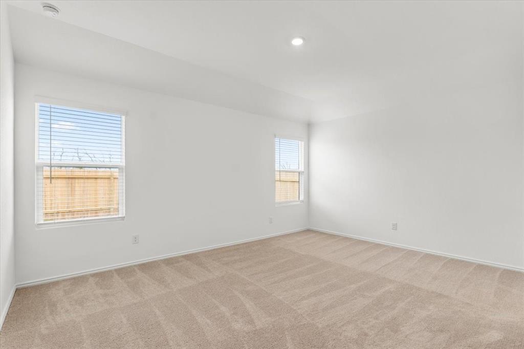 487 Alamito Avenue Kyle, TX 78640 - Photo 23 of 36 an empty room with a window