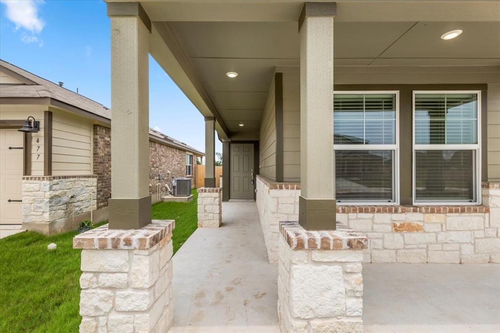 487 Alamito Avenue Kyle, TX 78640 - Photo 5 of 36 a house view with a outdoor space