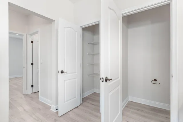 a view of a room with racks on the wall