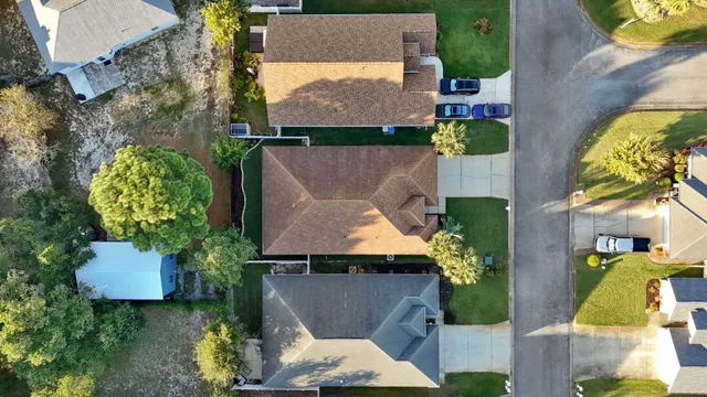 a view of a street with lots of trees
