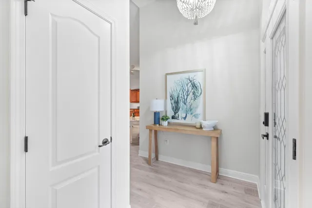 a view of kitchen with stainless steel appliances granite countertop furniture and a window