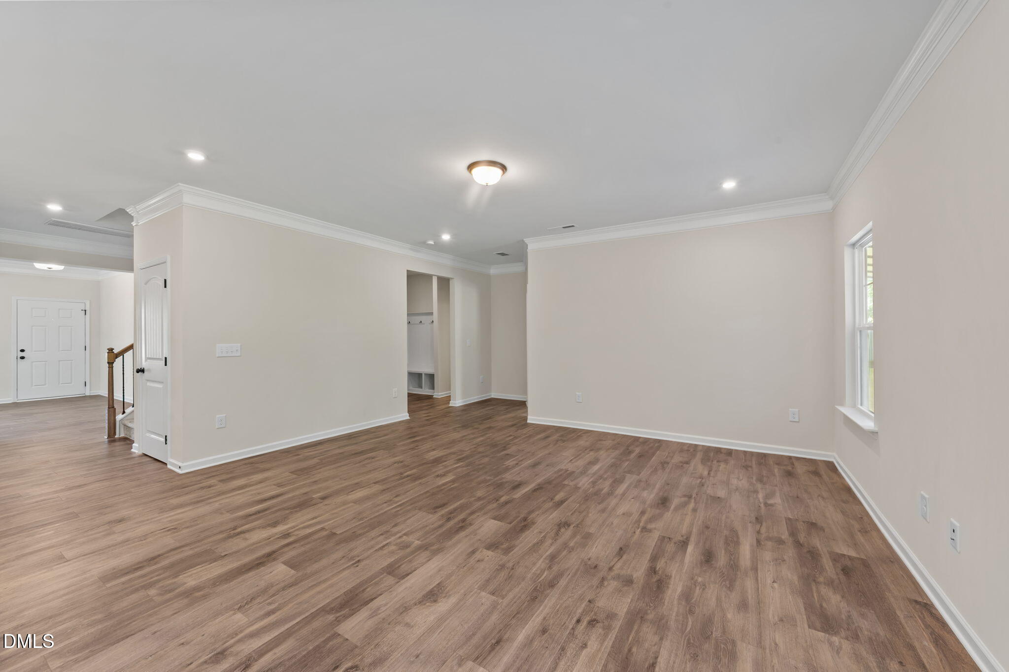 3901 Bluffwind Drive Raleigh, NC 27603 - Photo 14 of 42 a view of an empty room with wooden floor