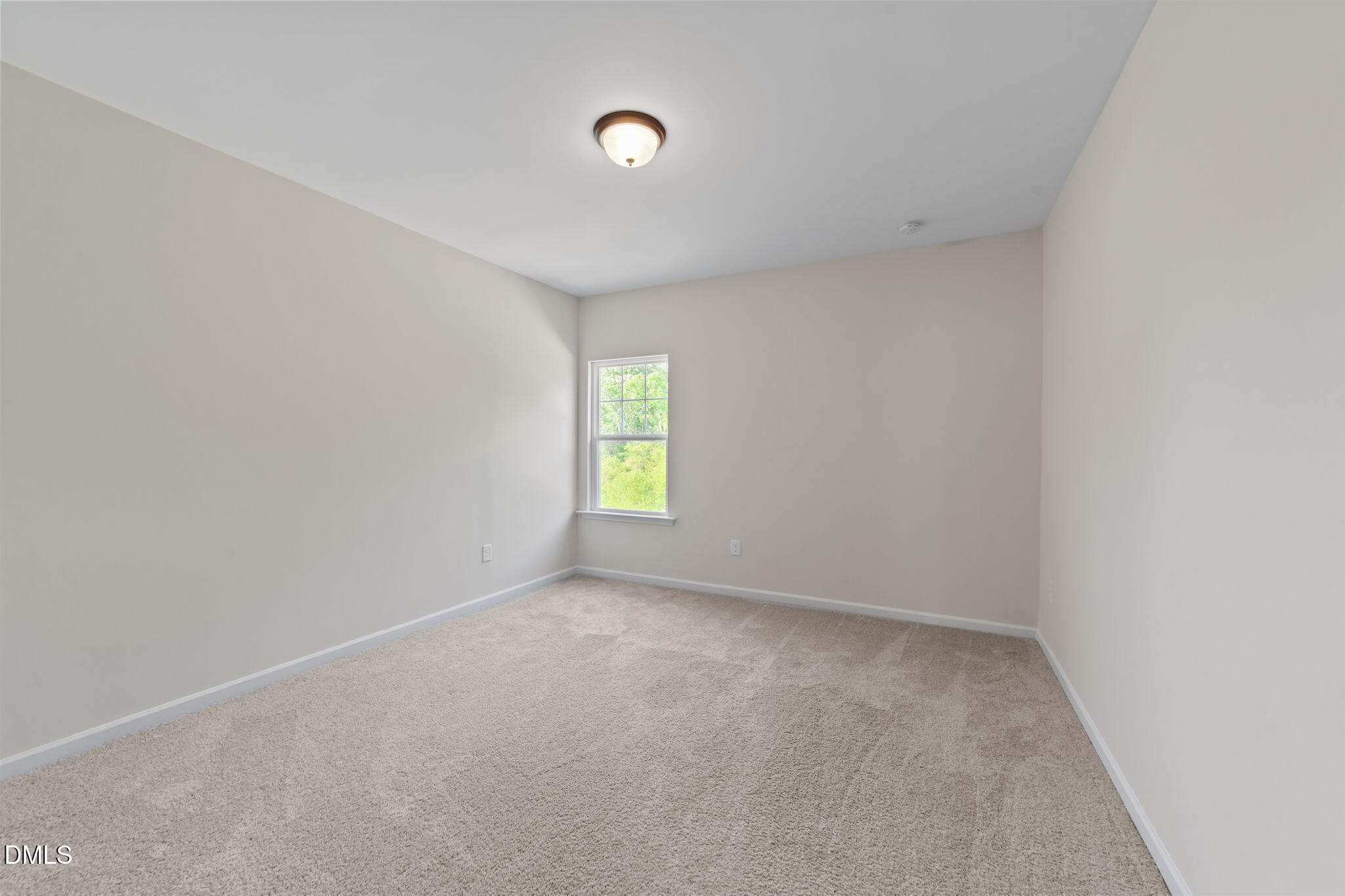 3901 Bluffwind Drive Raleigh, NC 27603 - Photo 24 of 42 a view of an empty room with a window