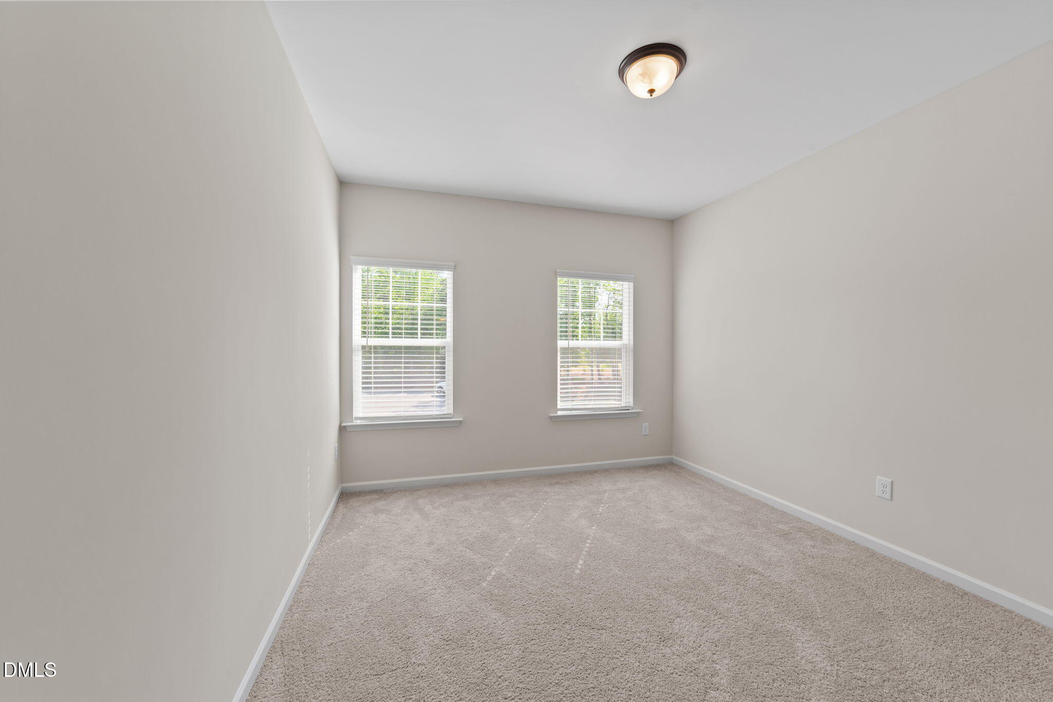 3901 Bluffwind Drive Raleigh, NC 27603 - Photo 27 of 42 an empty room with windows