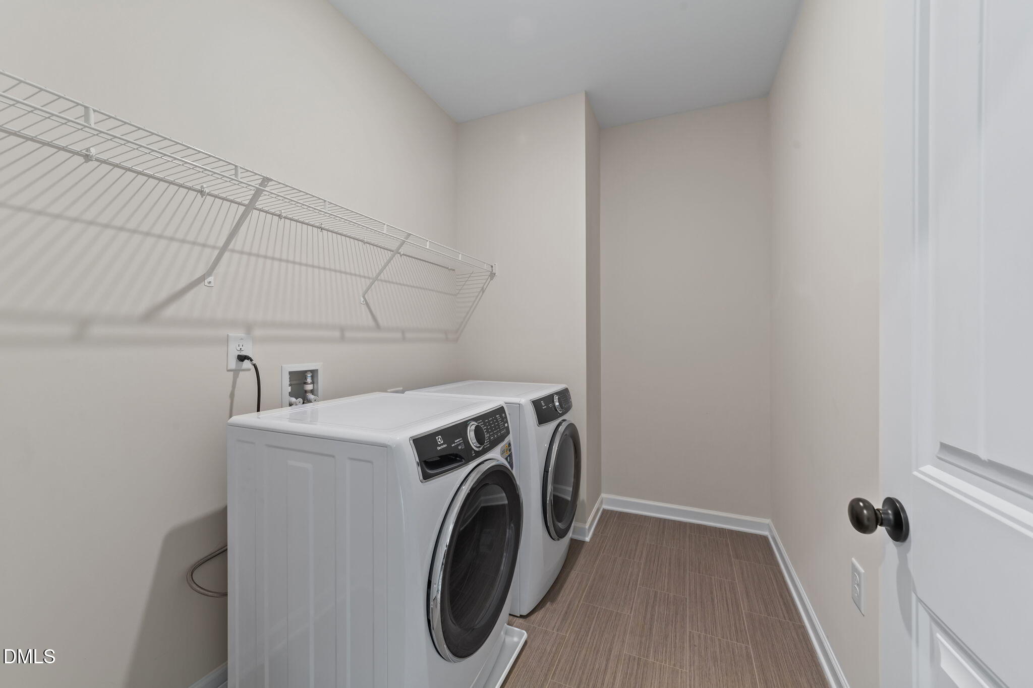 3901 Bluffwind Drive Raleigh, NC 27603 - Photo 29 of 42 a utility room with dryer and washer