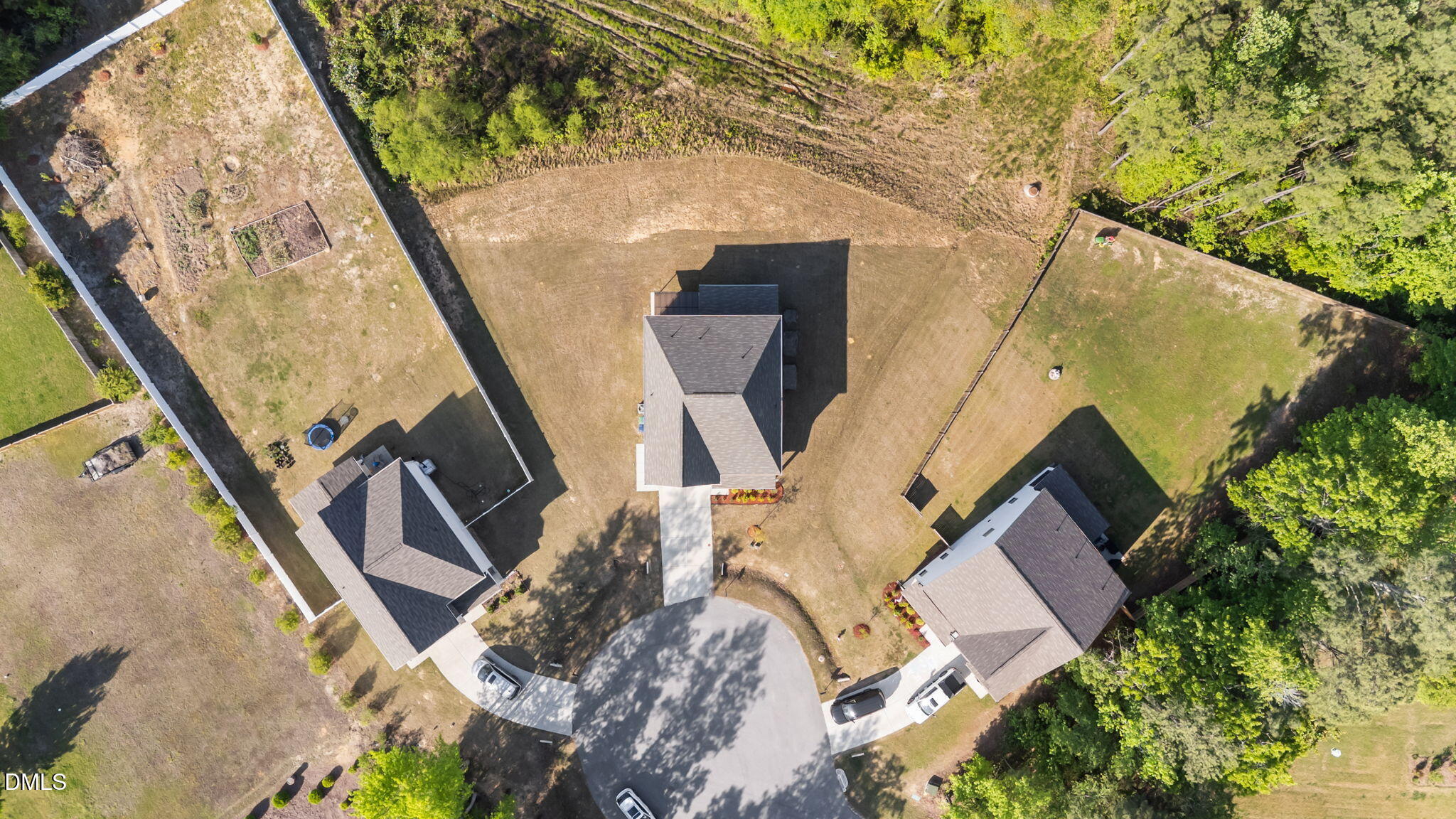 3901 Bluffwind Drive Raleigh, NC 27603 - Photo 38 of 42 an aerial view of a house with a yard
