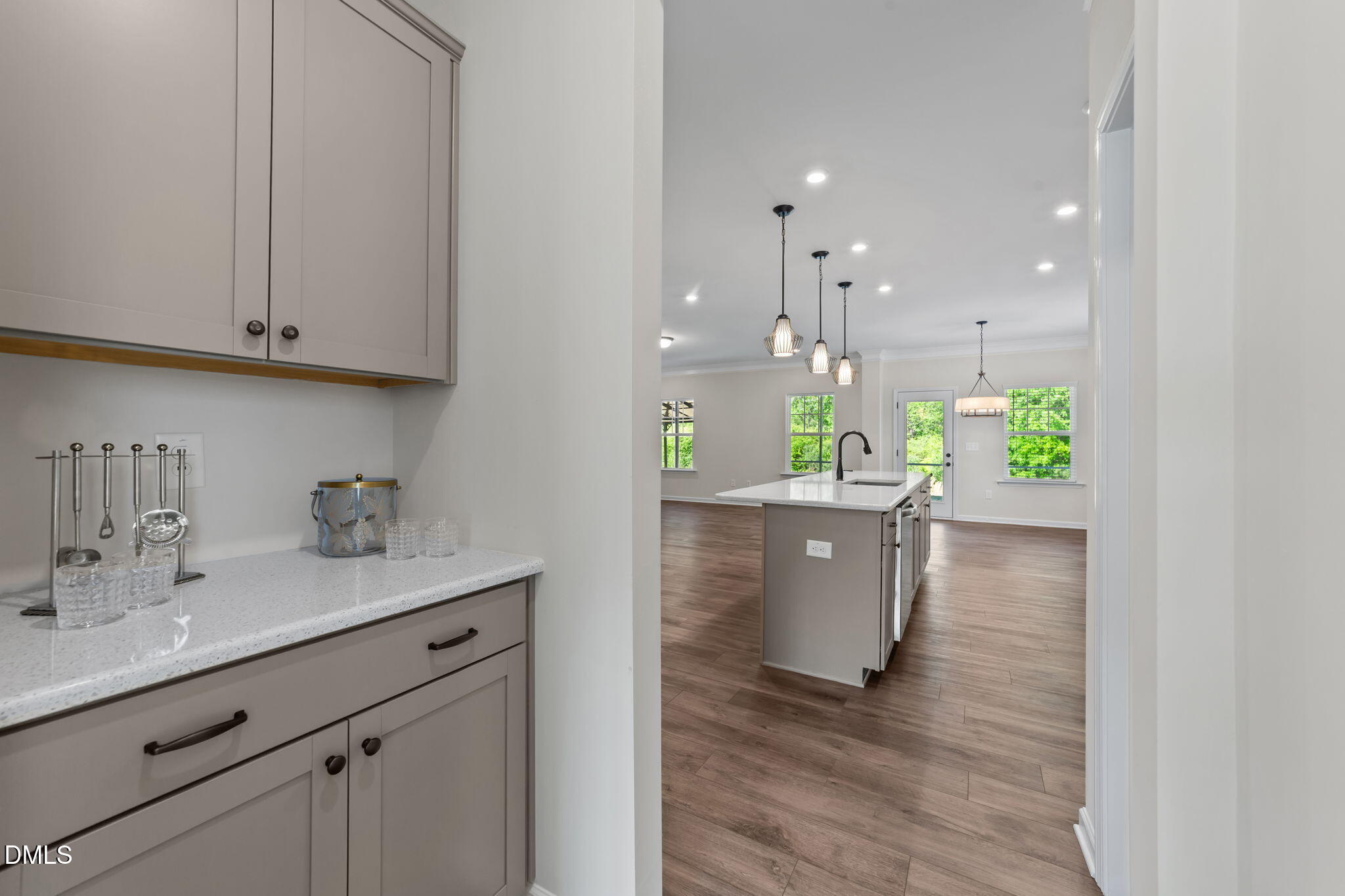 3901 Bluffwind Drive Raleigh, NC 27603 - Photo 6 of 42 a view of kitchen and kitchen with a sink wooden floor