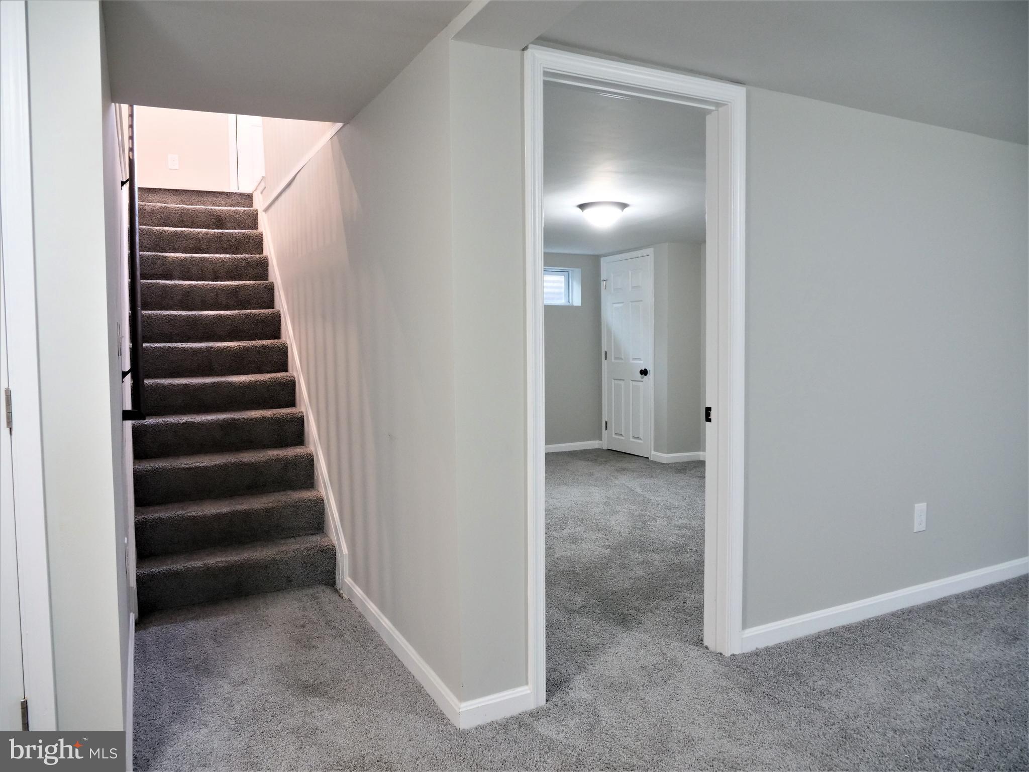 4712 Three Oaks Road Pikesville, MD 21208 - Photo 13 of 18 Stairs to Finished Basement