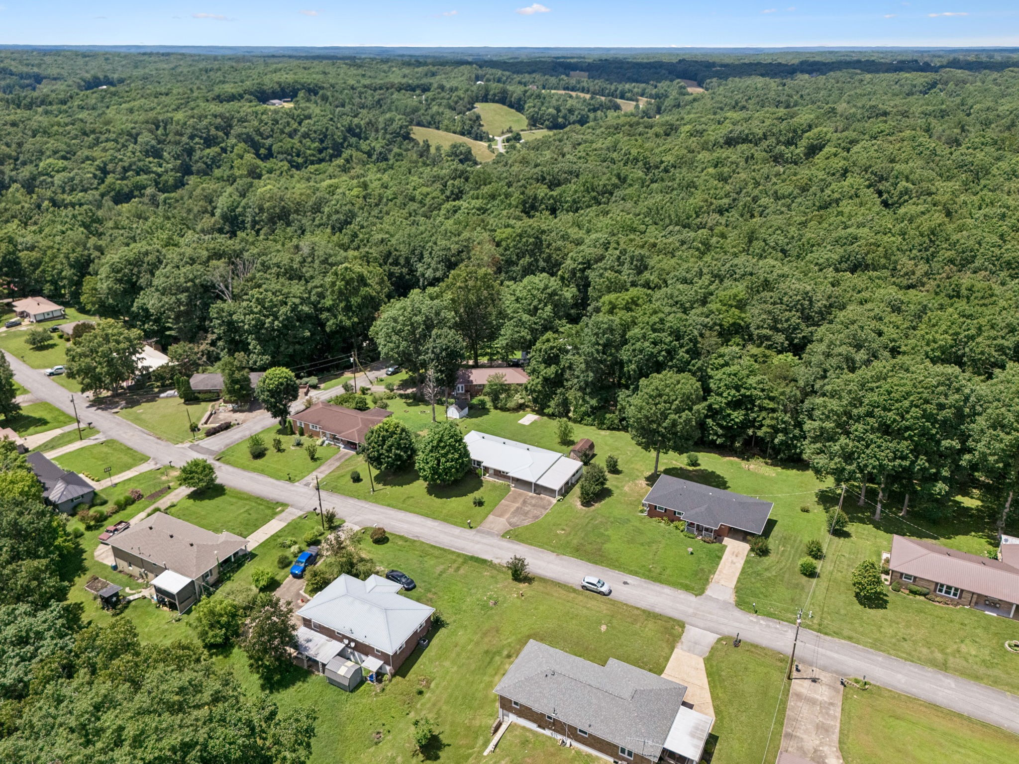 708 Hickory Street Centerville, TN 37033 - Photo 44 of 57 an aerial view of residential house with outdoor space