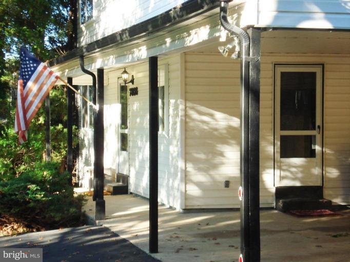 7808 Miller Fall Road Derwood, MD 20855 - Photo 15 of 30 COVERED CEMENT FRONT PORCH ENTRY !