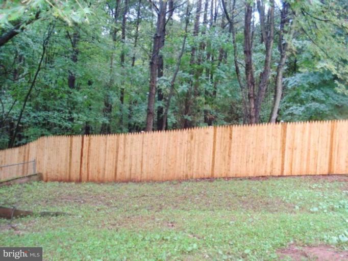 7808 Miller Fall Road Derwood, MD 20855 - Photo 16 of 30 LARGE NEWLY FENCED YARD has many GATES*DECK&4SHEDS