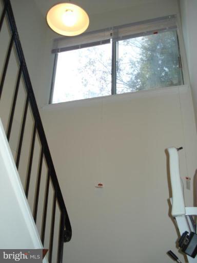 7808 Miller Fall Road Derwood, MD 20855 - Photo 19 of 30 LIGHT-FILLED STAIR-CASE ! with 2 chair STAIR-LIFTS