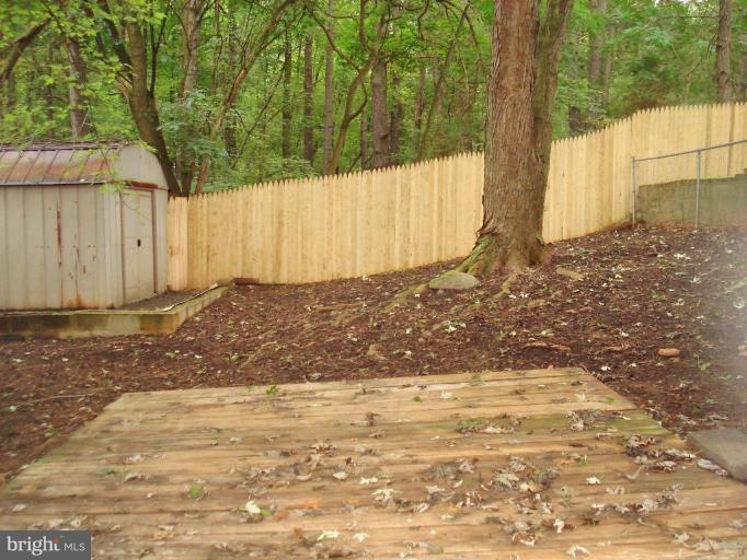 7808 Miller Fall Road Derwood, MD 20855 - Photo 27 of 30 Deck off FinishedLwr-Lvl FRENCH Drs to Fenced Yard