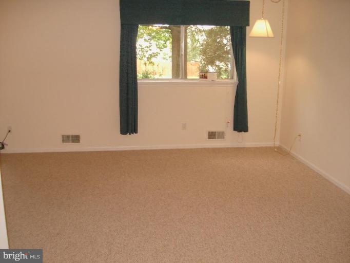 7808 Miller Fall Road Derwood, MD 20855 - Photo 30 of 30 SPACIOUS SUNKEN LIVING-ROOM w/NEW CARPETS & PAINT