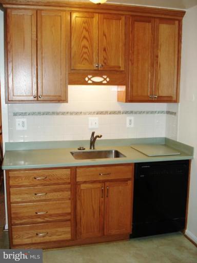 7808 Miller Fall Road Derwood, MD 20855 - Photo 9 of 30 UPDATED KITCHEN*CORIAN*CUSTOM CABINETRY*NEWFLOORS!