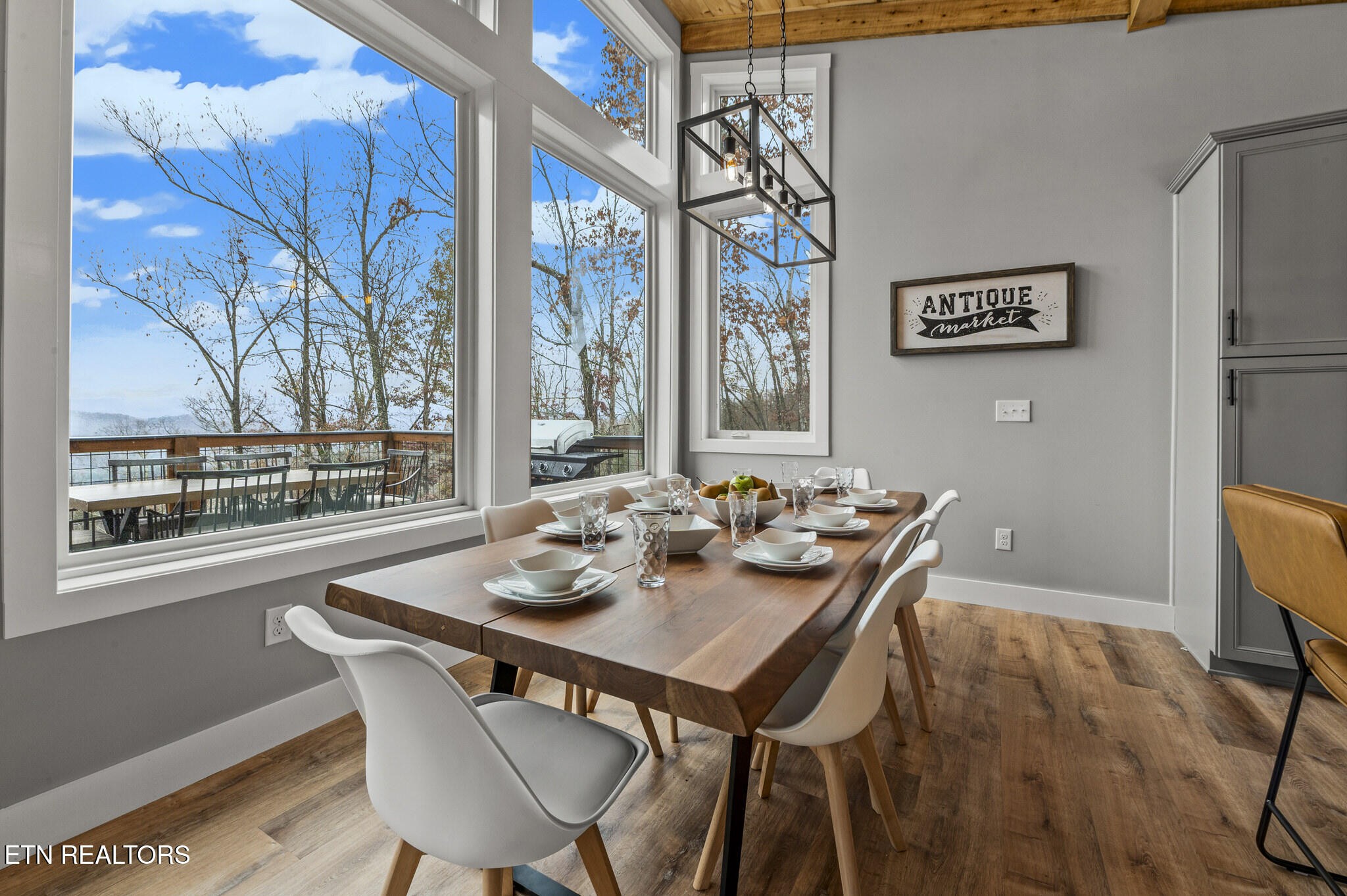 688 Shell Mountain Road Sevierville, TN 37876 - Photo 12 of 43 a view of a dining room with furniture and window
