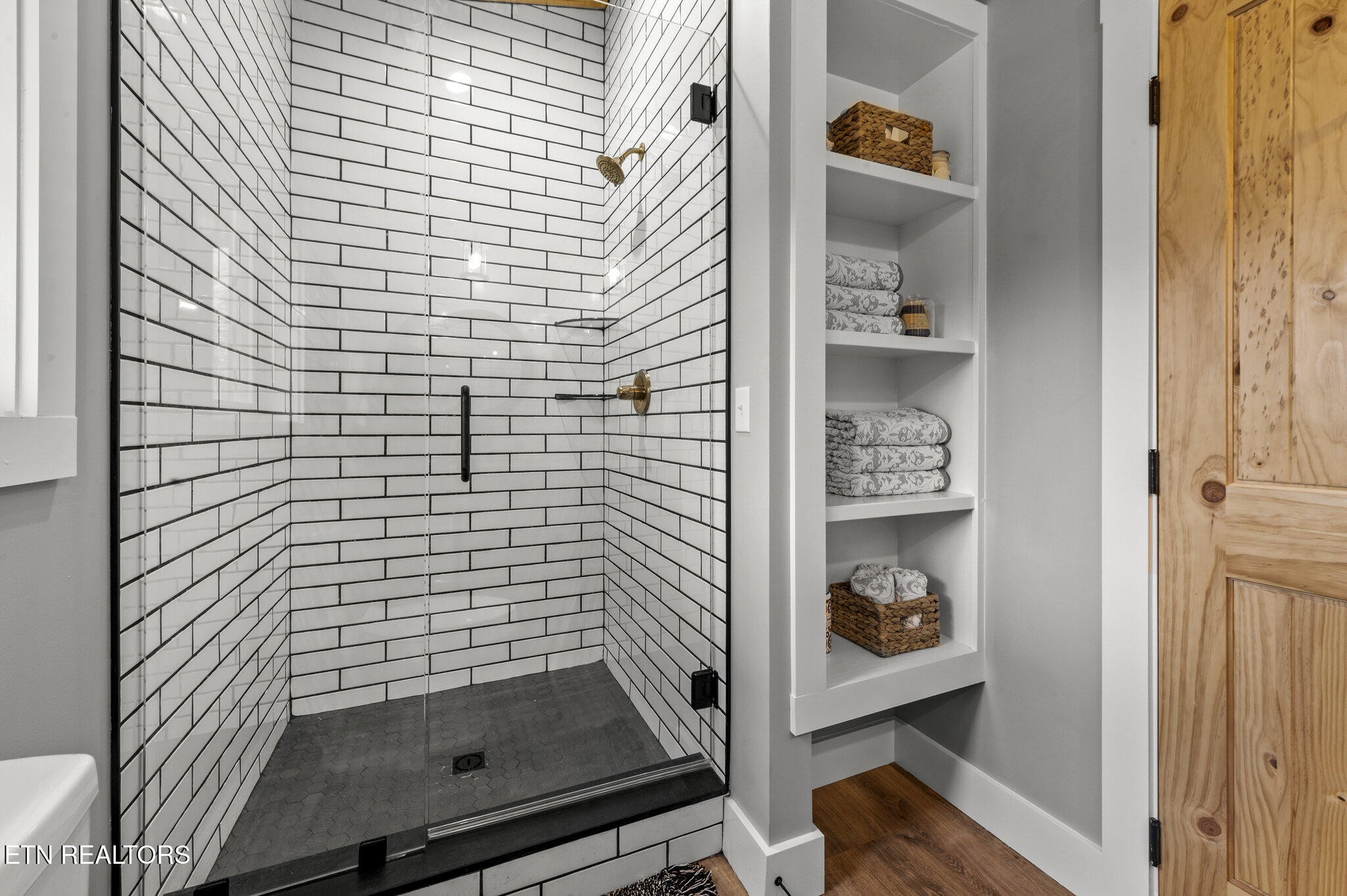 688 Shell Mountain Road Sevierville, TN 37876 - Photo 16 of 43 a bathroom with a shower