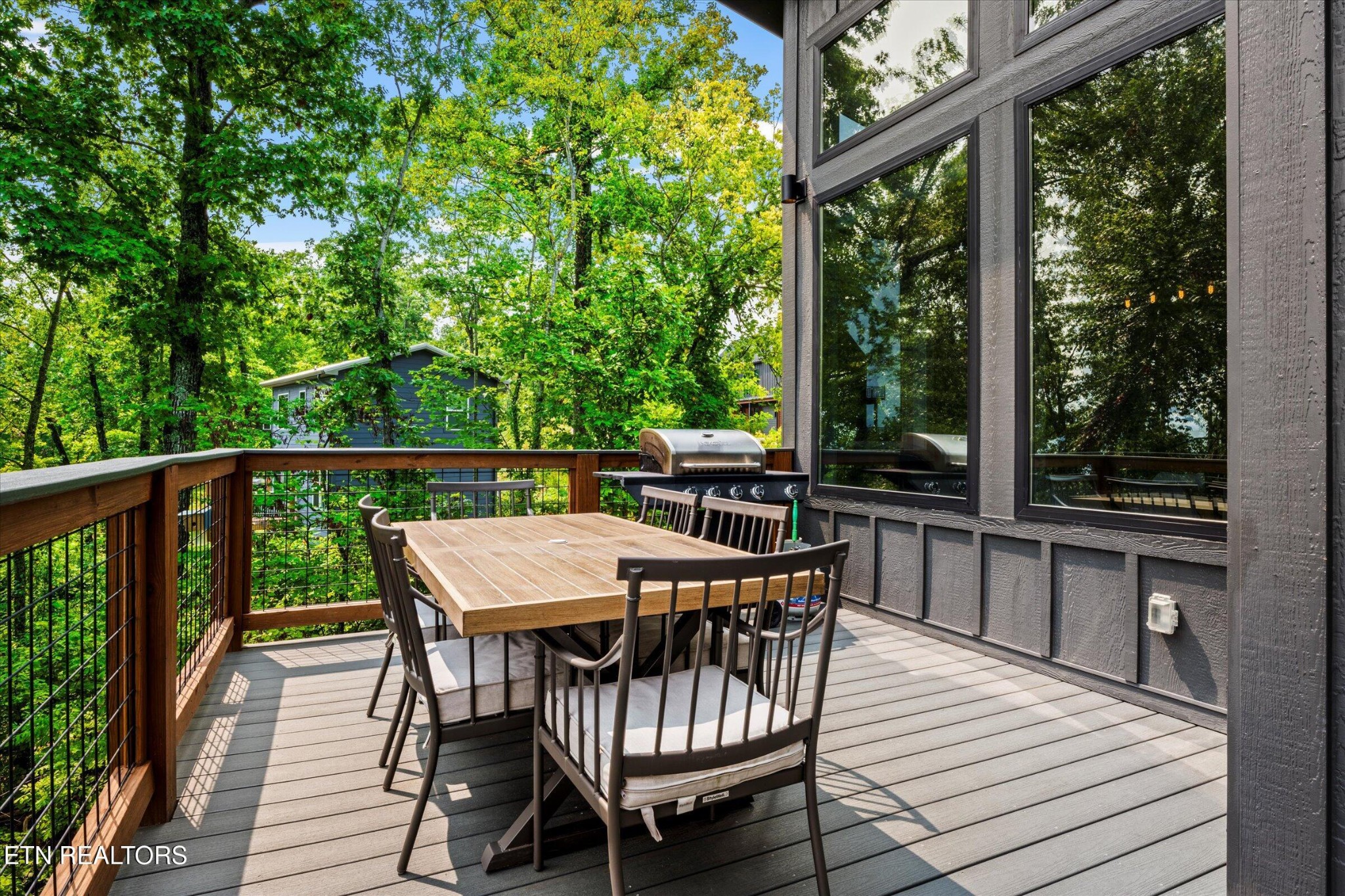 688 Shell Mountain Road Sevierville, TN 37876 - Photo 23 of 43 a view of a deck with furniture and wooden deck