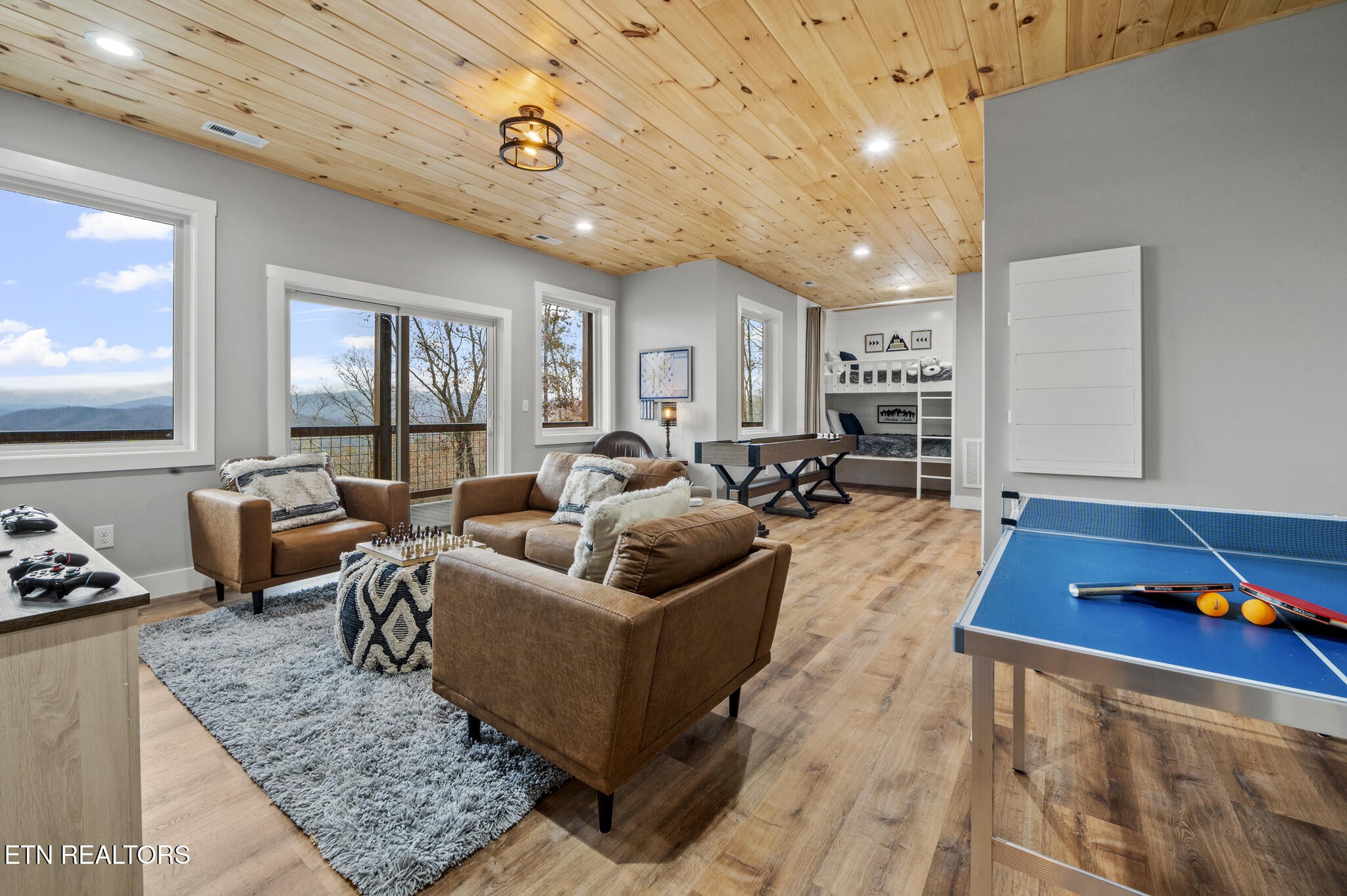 688 Shell Mountain Road Sevierville, TN 37876 - Photo 24 of 43 a living room with furniture and a couch
