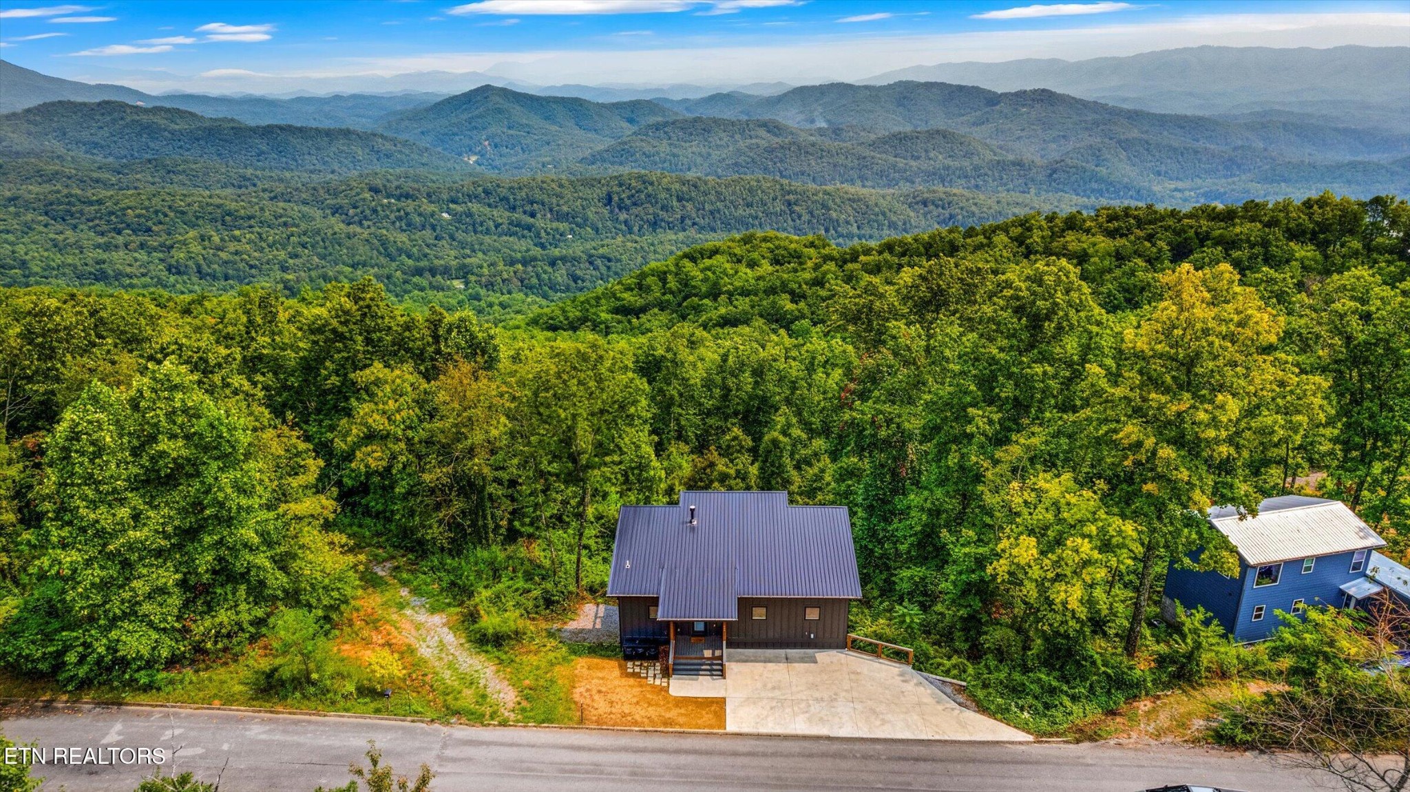 688 Shell Mountain Road Sevierville, TN 37876 - Photo 43 of 43 a view of a yard with an outdoor space