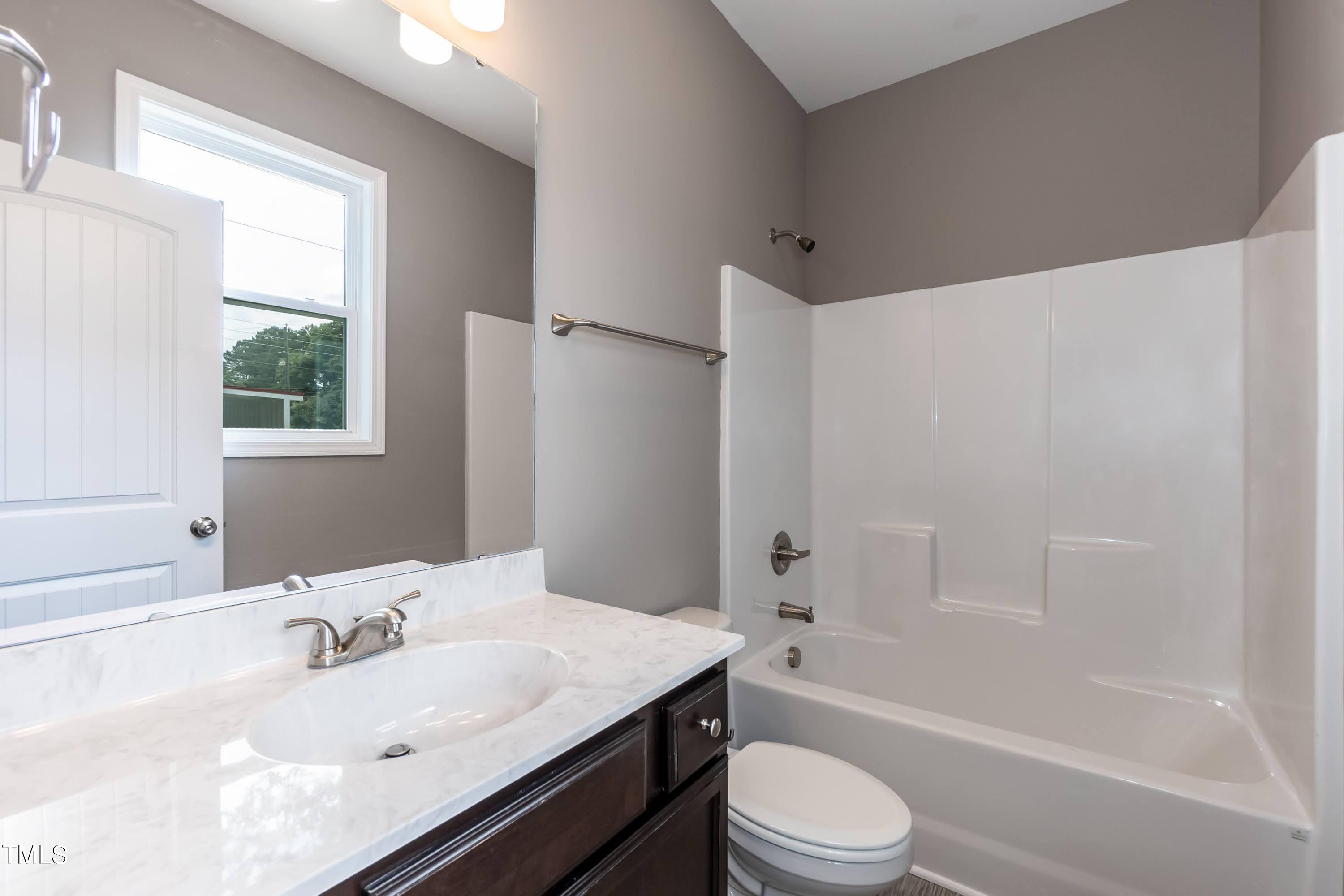 809 East Edgerton Street Dunn, NC 28334 - Photo 15 of 18 Master Bath 01