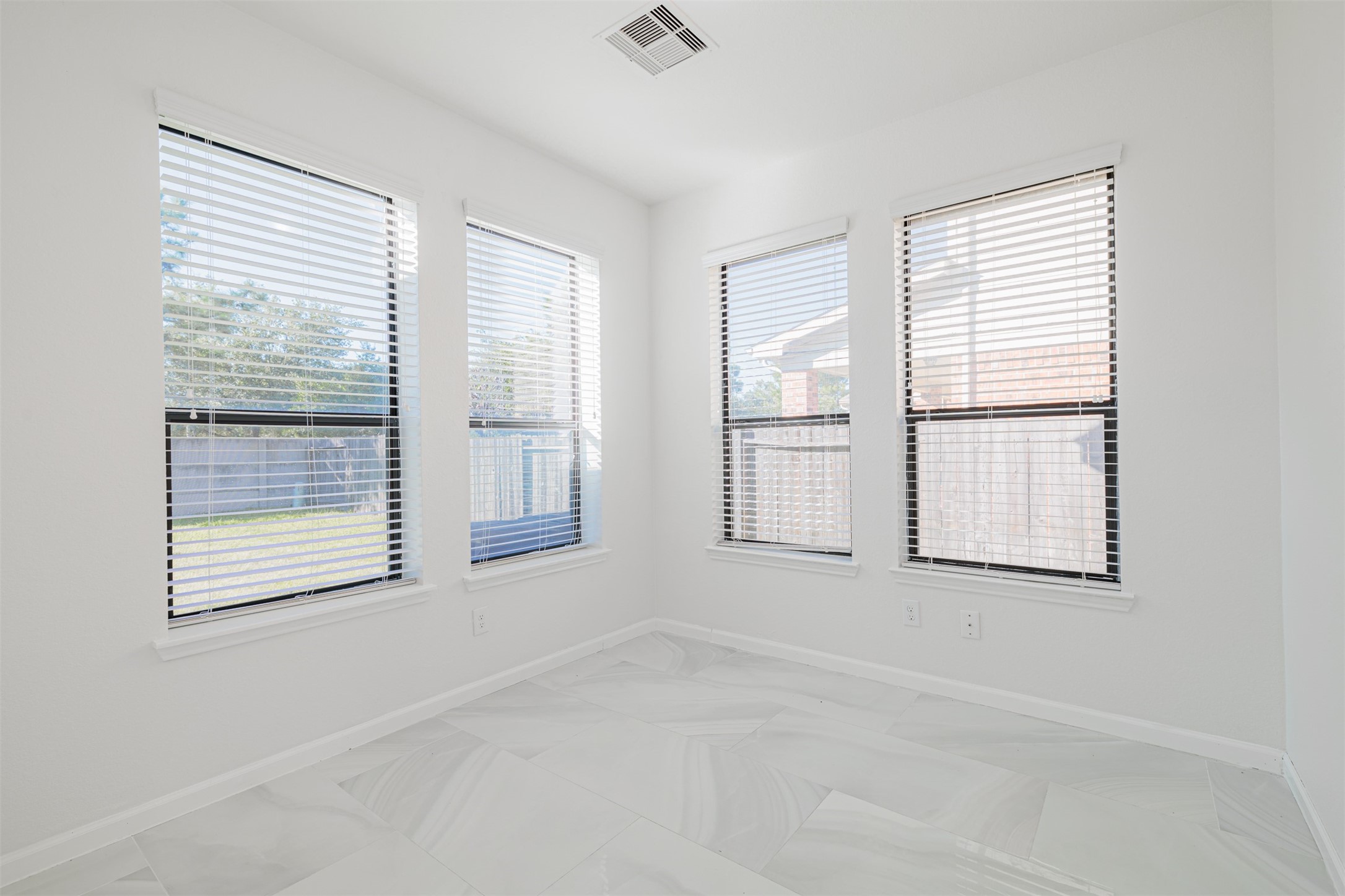 7814 Pacific Spring Lane Richmond, TX 77407 - Photo 17 of 32 an empty room with windows