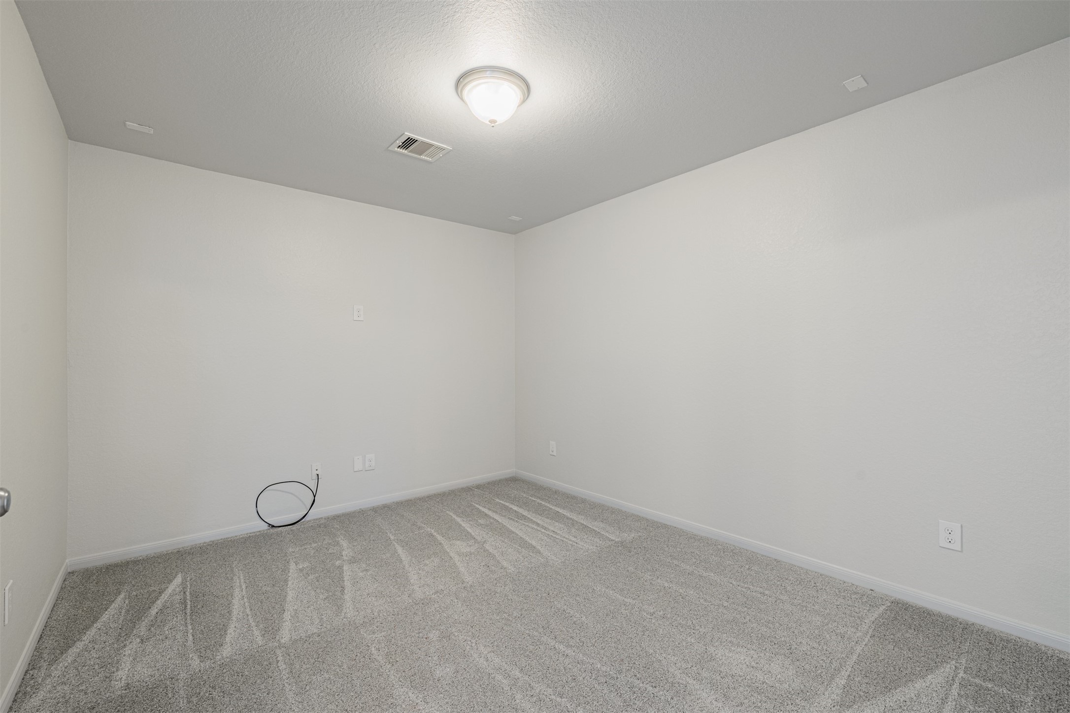 7814 Pacific Spring Lane Richmond, TX 77407 - Photo 24 of 32 a view of an empty room
