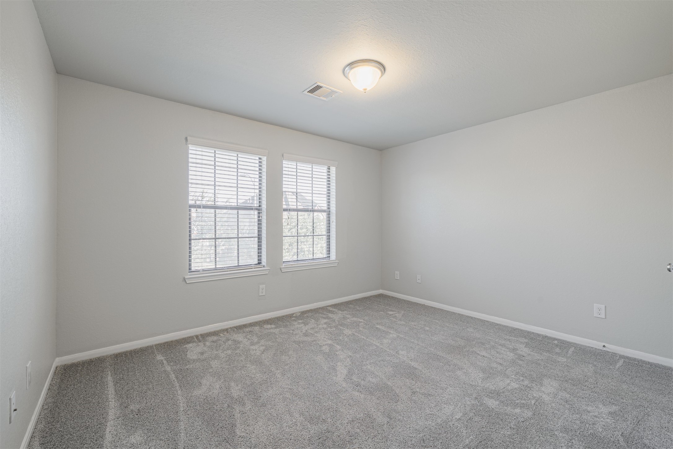 7814 Pacific Spring Lane Richmond, TX 77407 - Photo 28 of 32 an empty room with a window