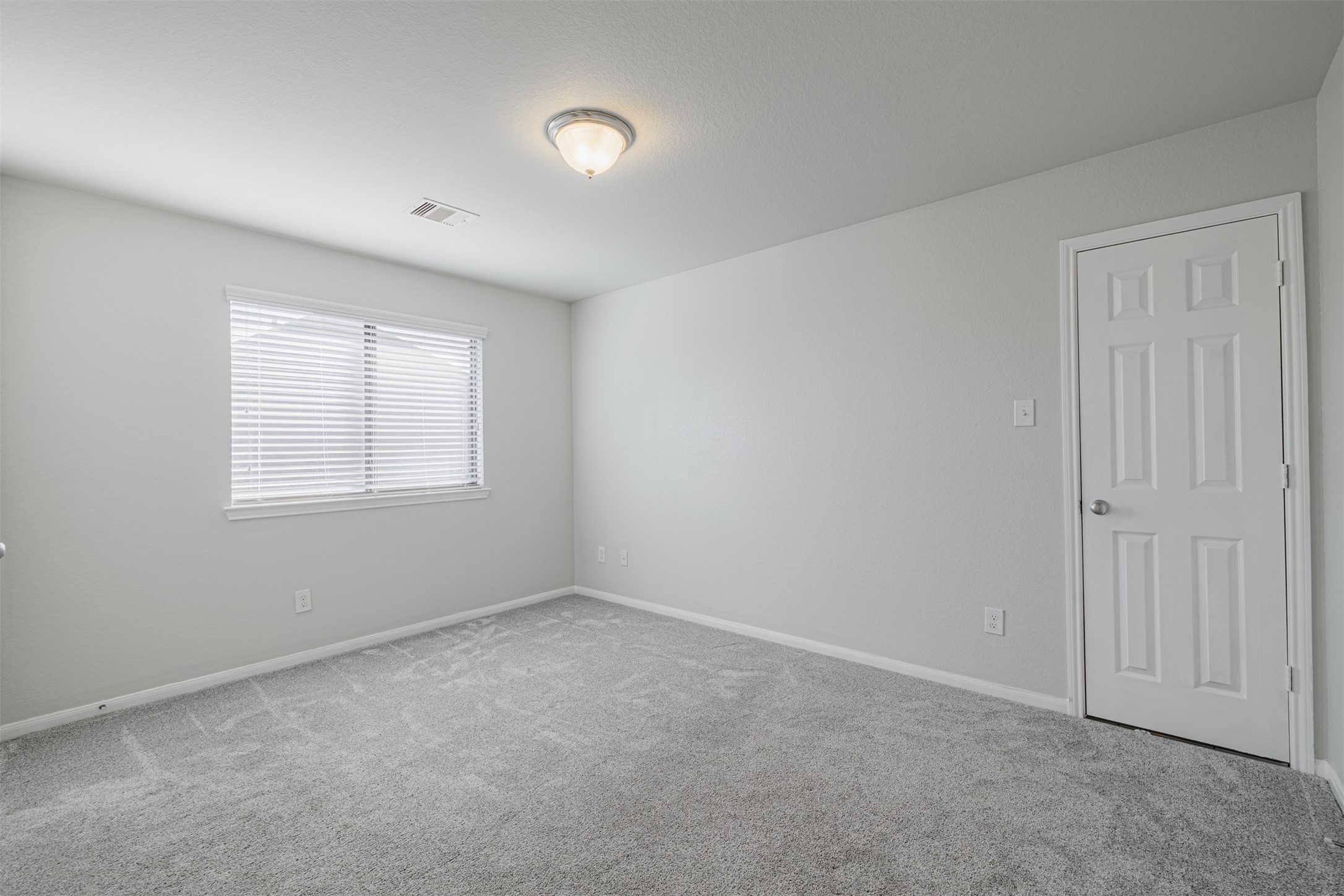 7814 Pacific Spring Lane Richmond, TX 77407 - Photo 31 of 32 an empty room with windows