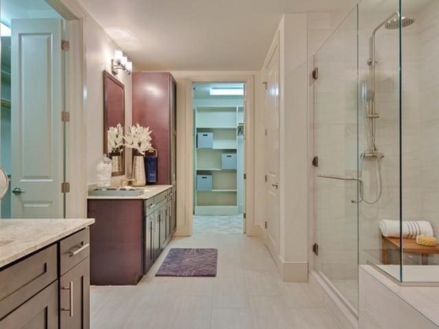 7775 Firefall Way, Unit 1520 Dallas, TX 75230 - Photo 11 of 23 a bathroom with a sink vanity and a mirror