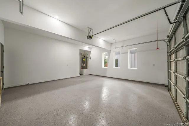 a view of a big room with closet and windows