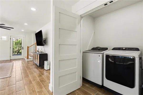 a view of living room washer and dryer