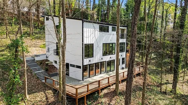 a balcony with view of trees