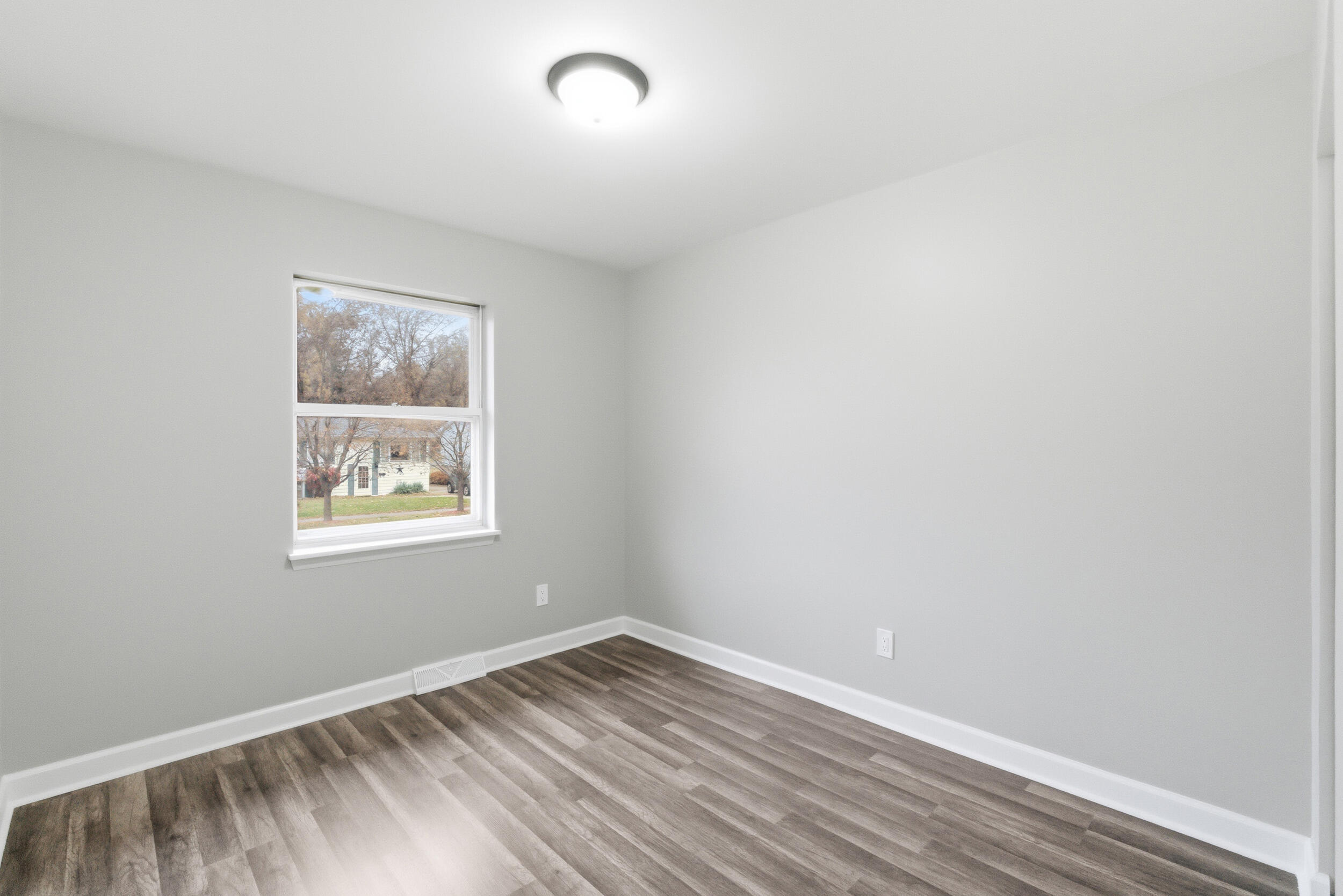 3610 175th Place Hammond, IN 46323 - Photo 11 of 21 an empty room with a window