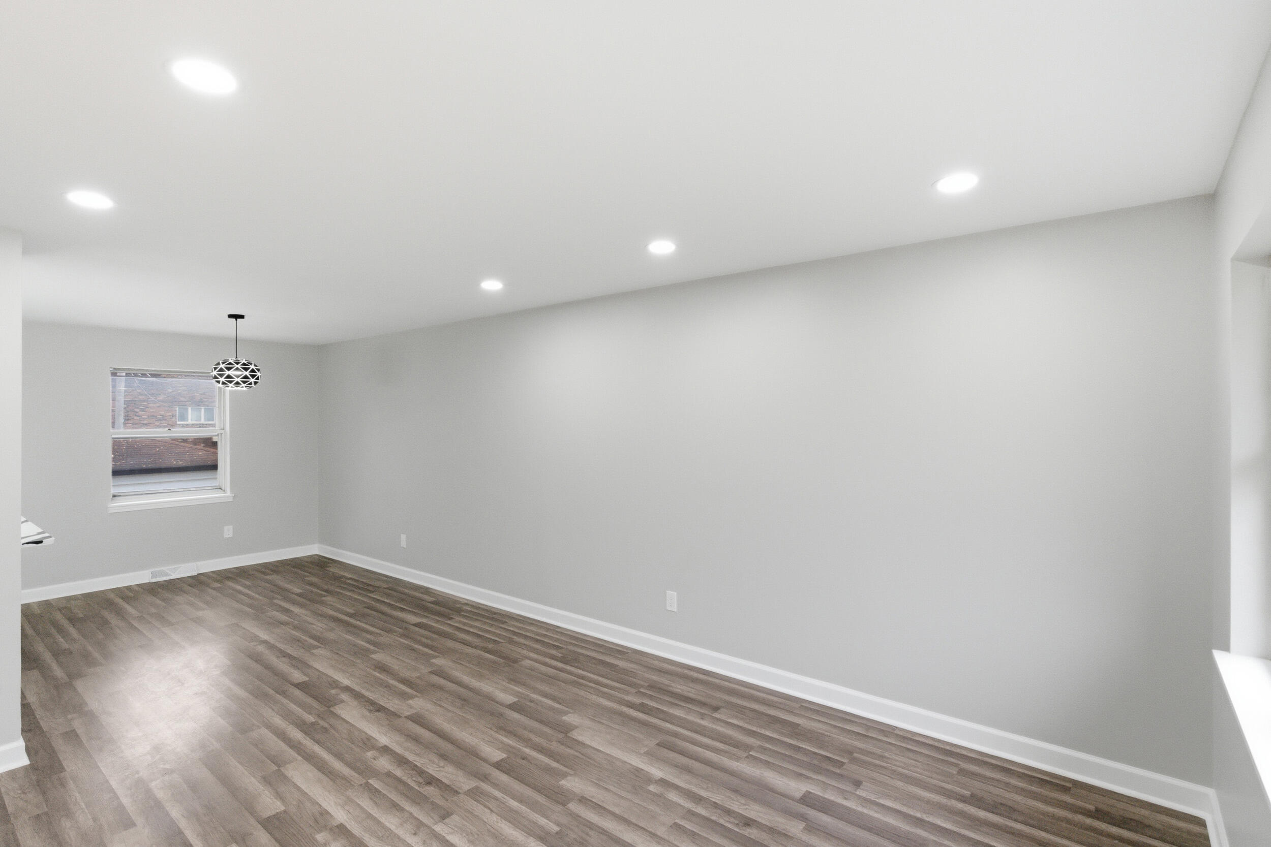 3610 175th Place Hammond, IN 46323 - Photo 14 of 21 a view of room with wooden floor and window