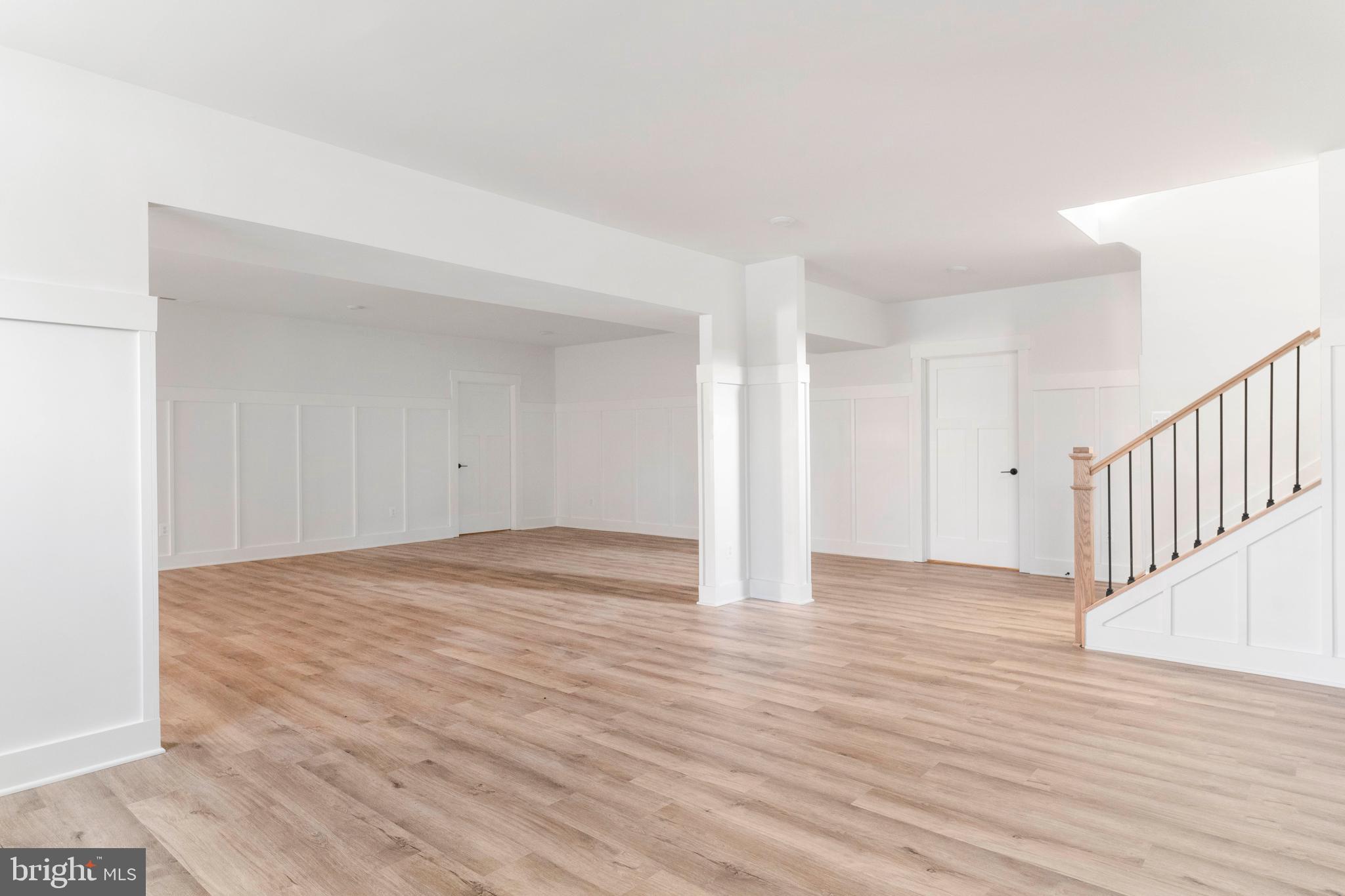 3321 Patuxent River Road Davidsonville, MD 21035 - Photo 60 of 81 a view of an empty room with wooden floor