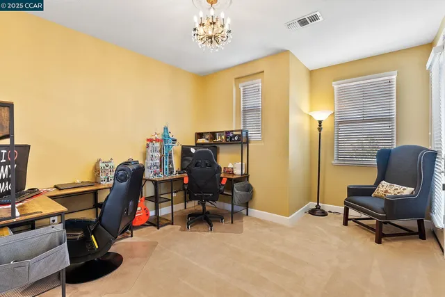 a en suite bathroom with a sink double vanity and shower