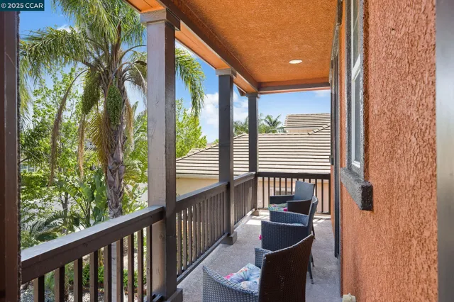 a en suite bathroom with a sink double vanity and shower