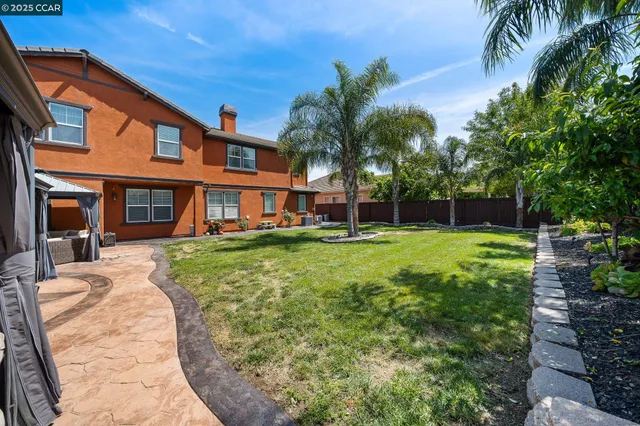 a outdoor space with patio lots of furniture