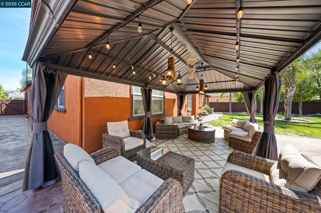 an aerial view of multiple houses with yard