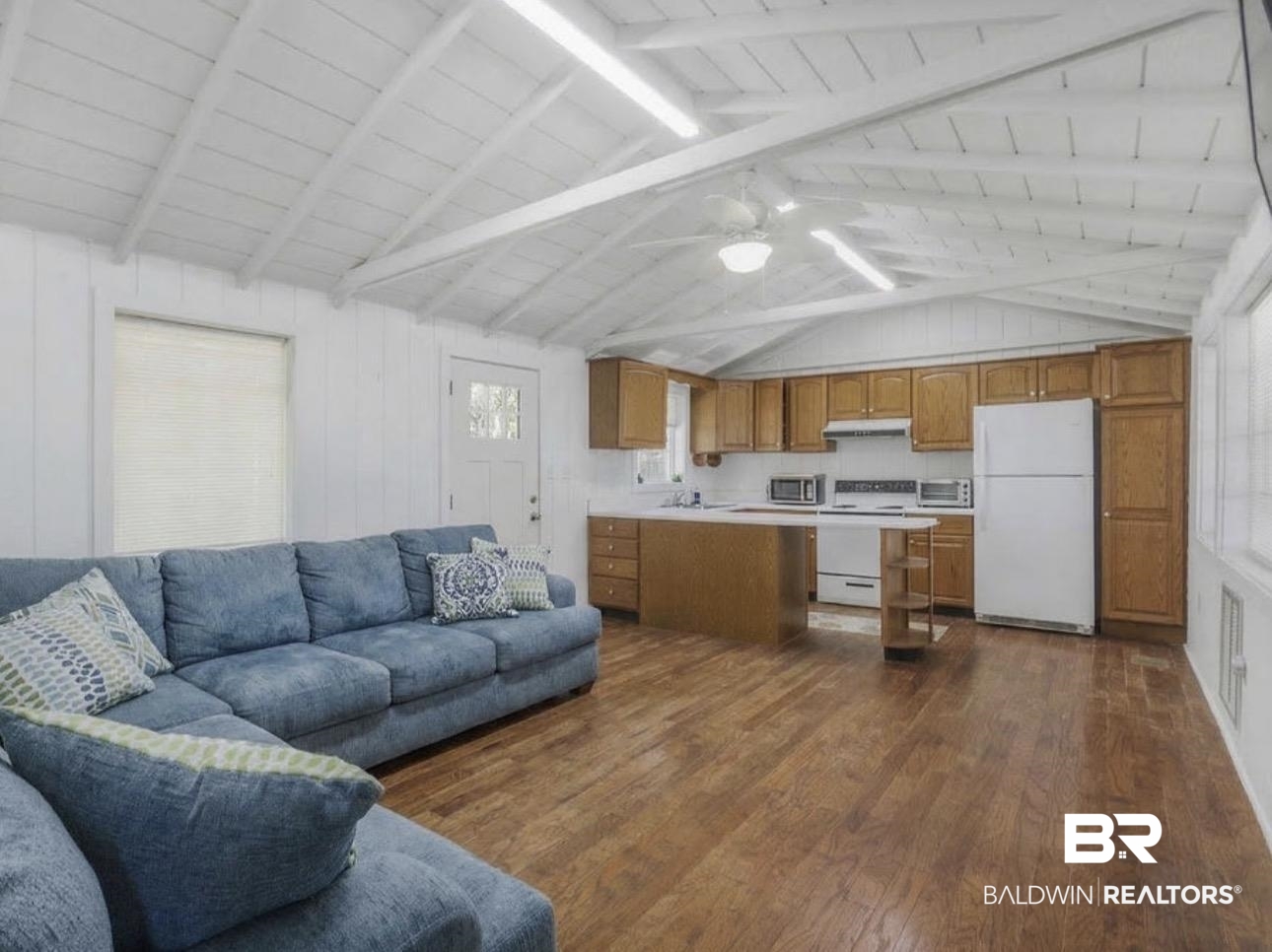11326 County Road 26 Foley, AL 36535 - Photo 13 of 20 Living area featuring a ceiling fan, dark wood finished floors, and beam ceiling