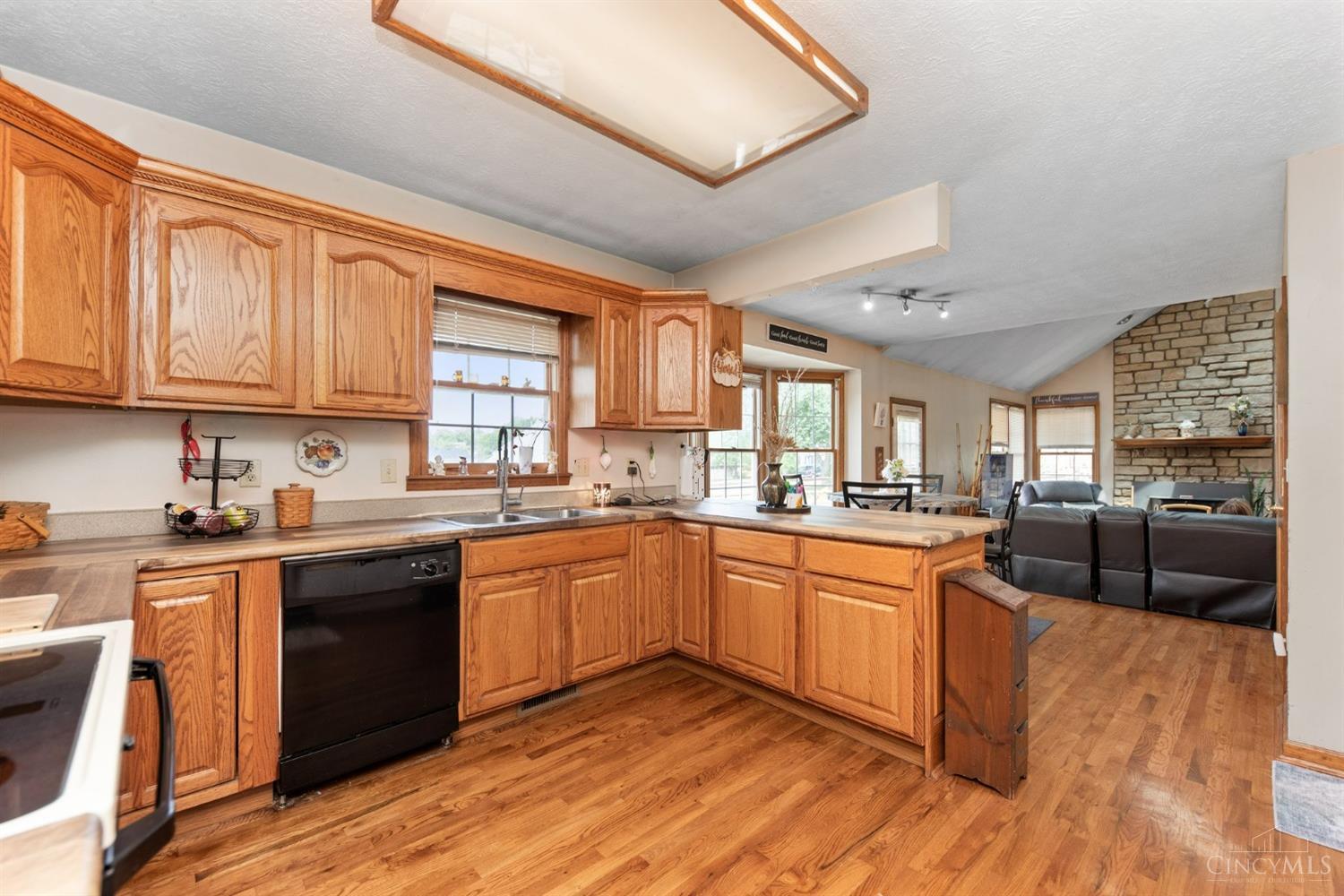 6361 Sharps Ridge Court Hamilton, OH 45011 - Photo 9 of 32 Kitchen is open to breakfast area and sunken family room.