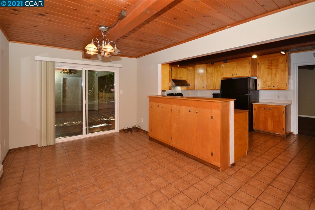 928 Janet Lane Lafayette, CA 94549 - Photo 11 of 35 a view of a livingroom with a chandelier furniture and a large window