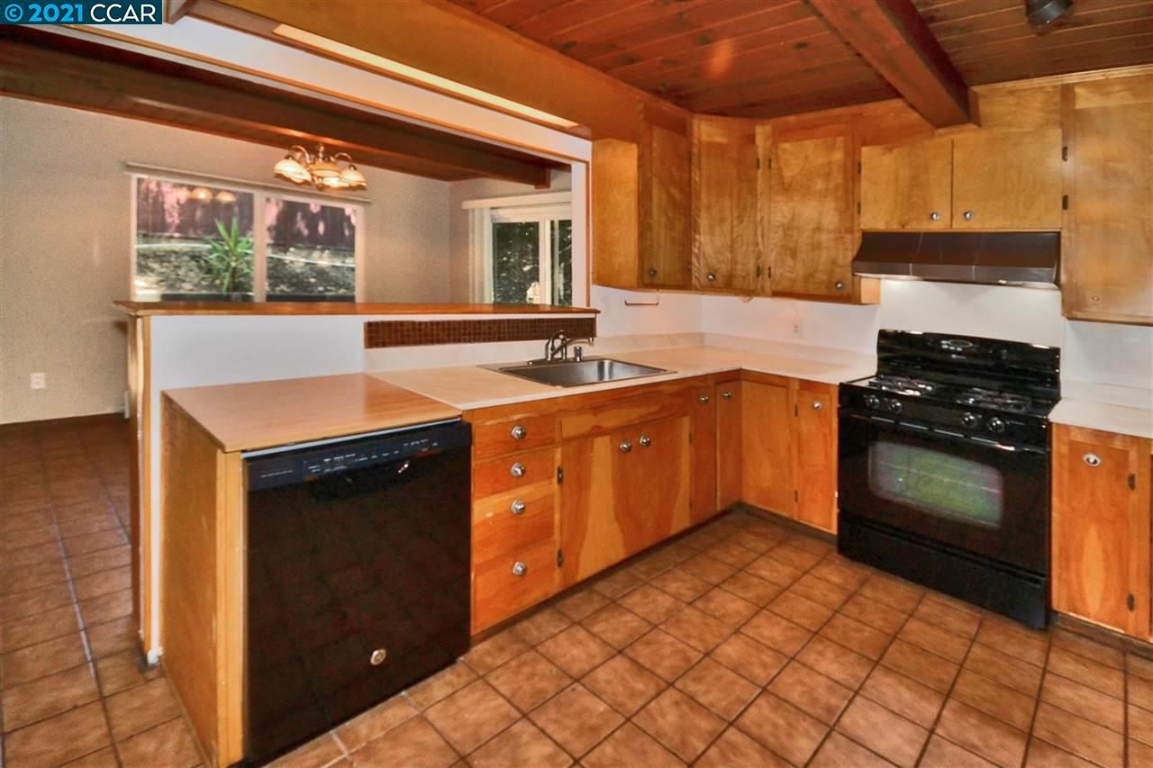 928 Janet Lane Lafayette, CA 94549 - Photo 13 of 35 a kitchen with a sink and cabinets