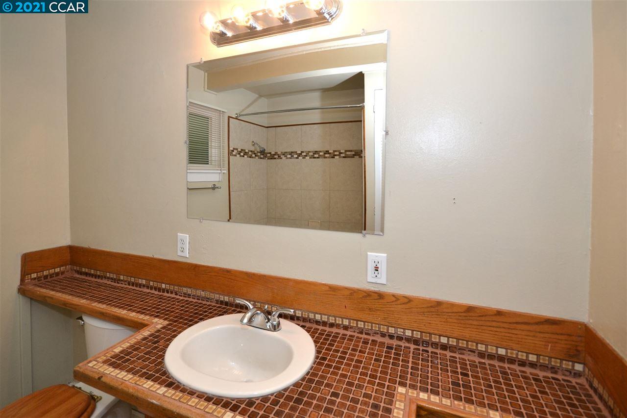 928 Janet Lane Lafayette, CA 94549 - Photo 18 of 35 a bathroom with a sink and a mirror
