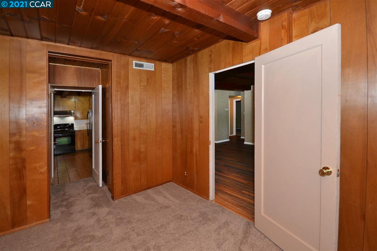 928 Janet Lane Lafayette, CA 94549 - Photo 24 of 35 an empty room with closet and wooden door