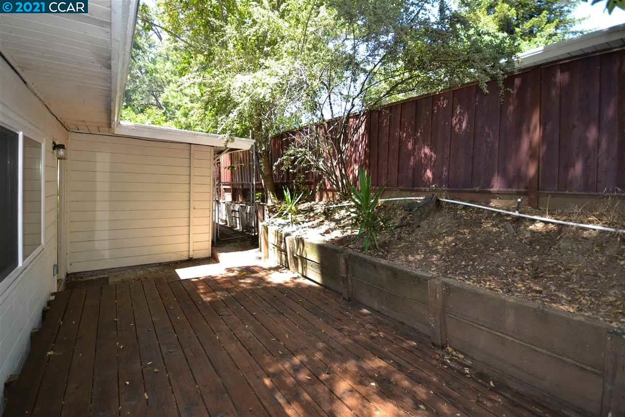928 Janet Lane Lafayette, CA 94549 - Photo 28 of 35 a view of a wooden door and a yard